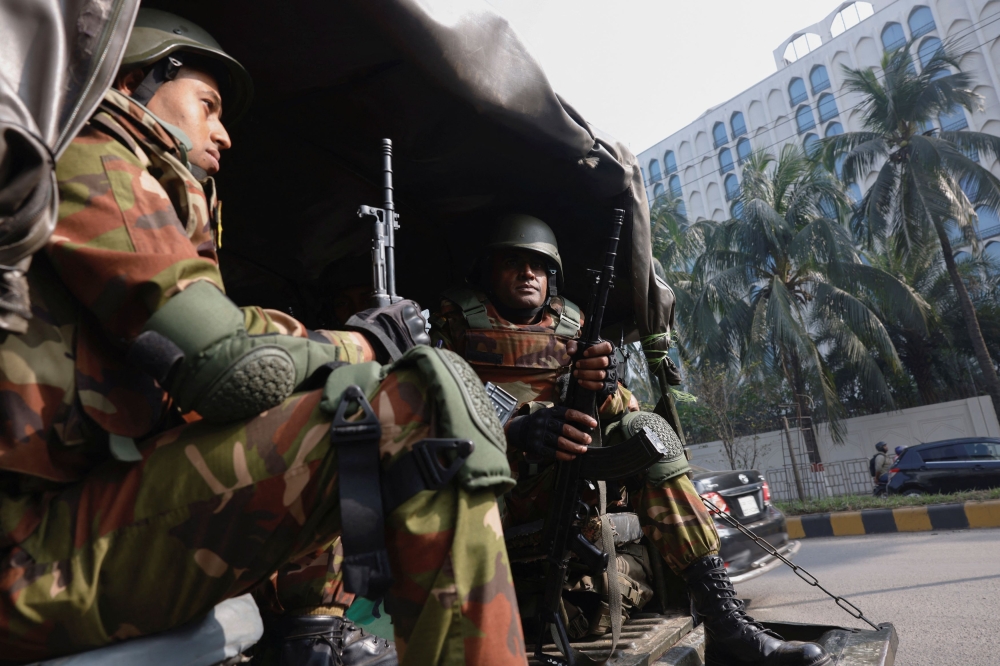 Members of Bangladesh Army arrive at a temporary camp, after the army was deployed across the country, in order to help civil administration during general election in Dhaka, Bangladesh, January 3, 2024. — Reuters pic
