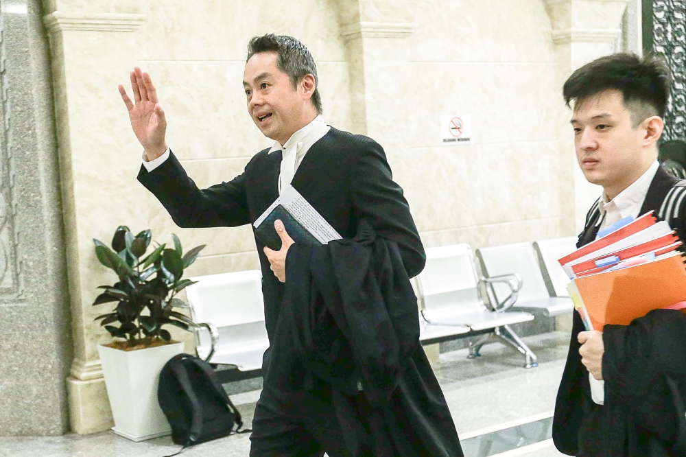 Lawyer Edmund Bon (right) and Micheal Cheah, representing the publisher Gerakbudaya Enterprise and Ngeo Boon Lin, are seen at the court of appeal for the ‘Gay Is Okay’ book ban case at the Palace Of Justice September 25, 2023. — Picture by Sayuti Zainudin