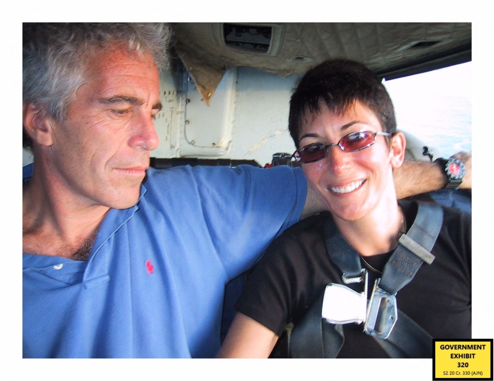 This undated trial evidence image obtained December 8, 2021, from the US District Court for the Southern District of New York shows British socialite Ghislaine Maxwell and US financier Jeffrey Epstein. — Handout / US District Court for the Southern District of New York / AFP pic