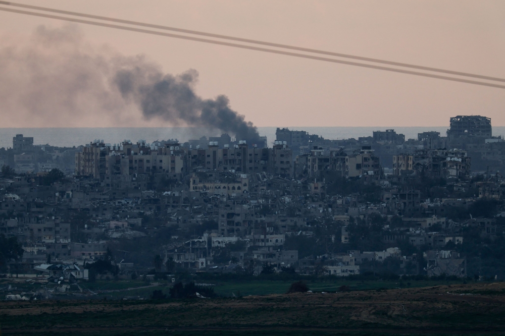 Smoke rises over Gaza, amid the ongoing conflict between Israel and the Palestinian Islamist group Hamas, as seen from southern Israel, January 4, 2024. — Reuters pic