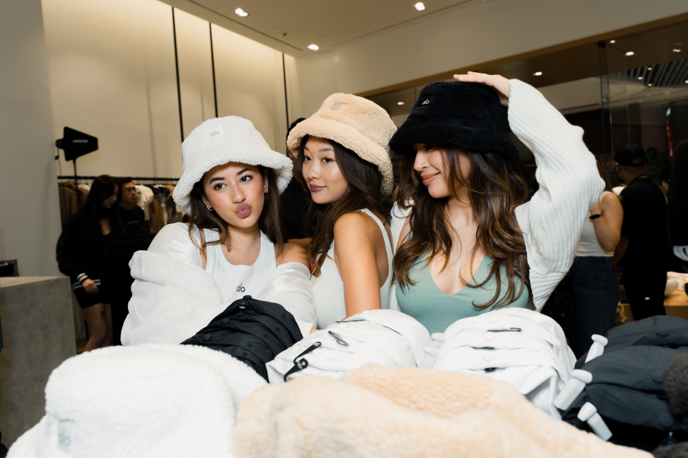 Local social media influencers cosying up at Alo's recent opening at The Exchange TRX. — Picture courtesy of Melium