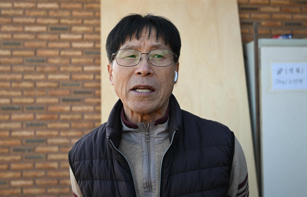 South Korean resident Jung Chang-kuan speaks during an interview with AFP. — AFP pic