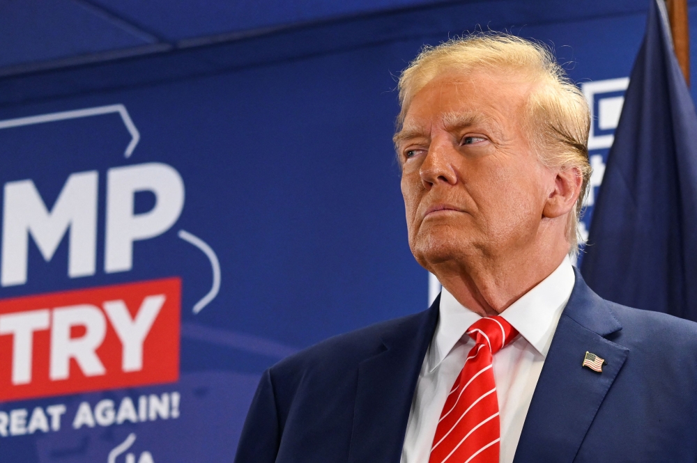 Former US President and Republican presidential candidate Donald Trump campaigns in Newton, Iowa, US, January 6, 2024. — Reuters pic 