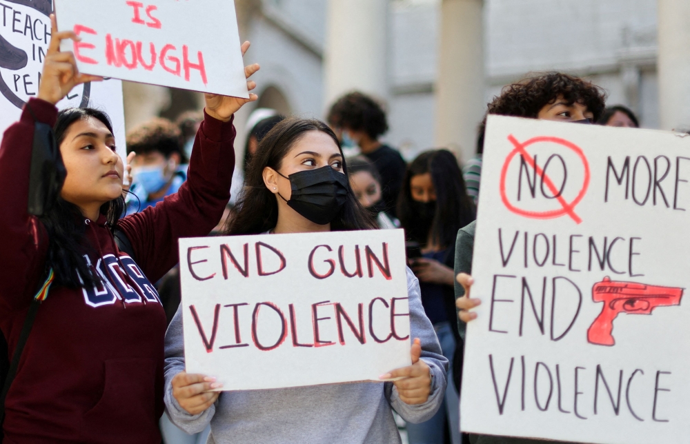 Students from Miguel Contreras Learning Center high school in Los Angeles demonstrate in front of City Hall after walking out of school to protest US gun violence, California, May 31, 2022. — Reuters pic 