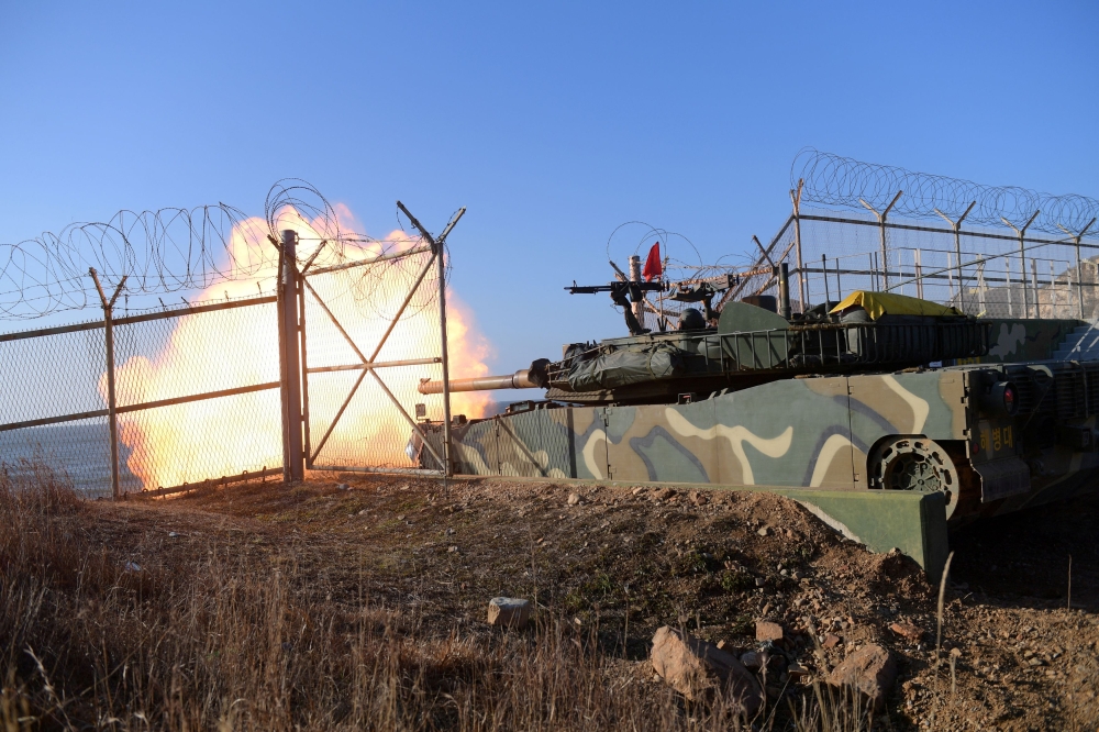South Korean marine’s K1E1 tank fires during a military drill on Yeonpyeong Island, South Korea, January 5, 2024. — The Defence Ministry handout pic via Reuters 