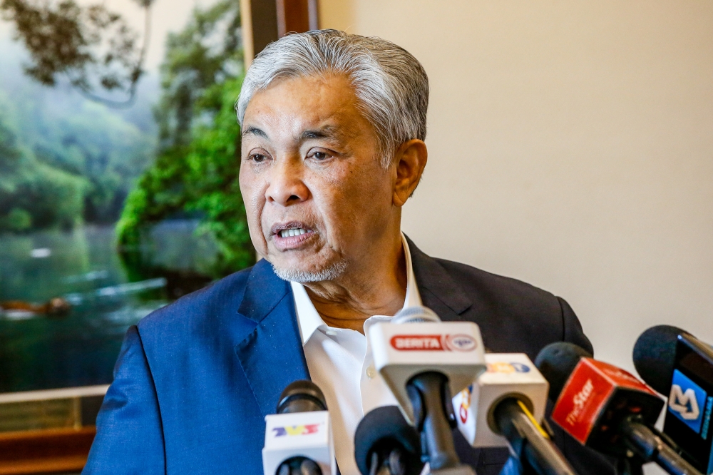 Deputy Prime Minister Datuk Seri Ahmad Zahid Hamidi said he would issue a statement regarding Sabah Umno tomorrow. — Picture by Hari Anggara.