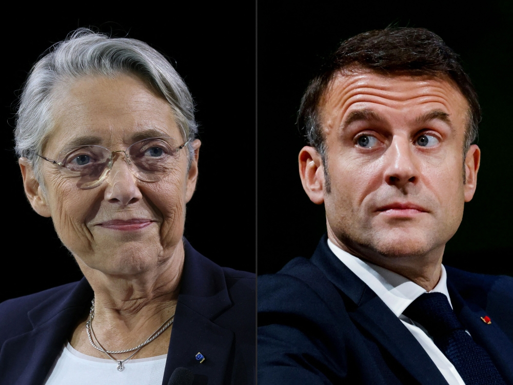 French President Emmanuel Macron meets with France's Prime Minister Elisabeth Borne to discuss 