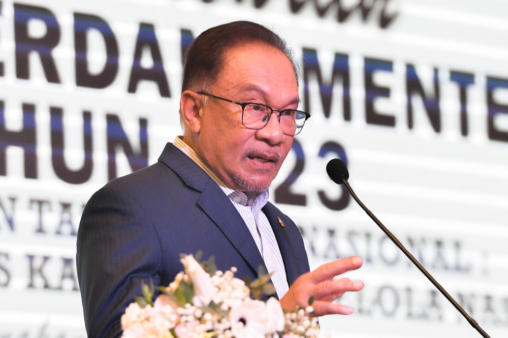 Prime Minister Datuk Seri Anwar Ibrahim delivers a speech at the launching ceremony of the National Good Governance Symposium at the Sama-Sama Hotel in Sepang January 8, 2023. —  Picture by Miera Zulyana