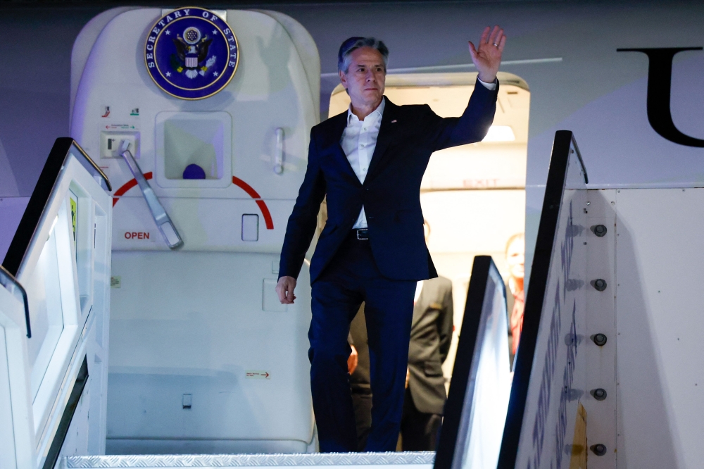 US Secretary of State Antony Blinken gestures as he arrives in Tel Aviv on January 8, 2024, during his week-long trip aimed at calming tensions across the Middle East. — Picture by Evelyn Hockstein/ Pool pic via AFP