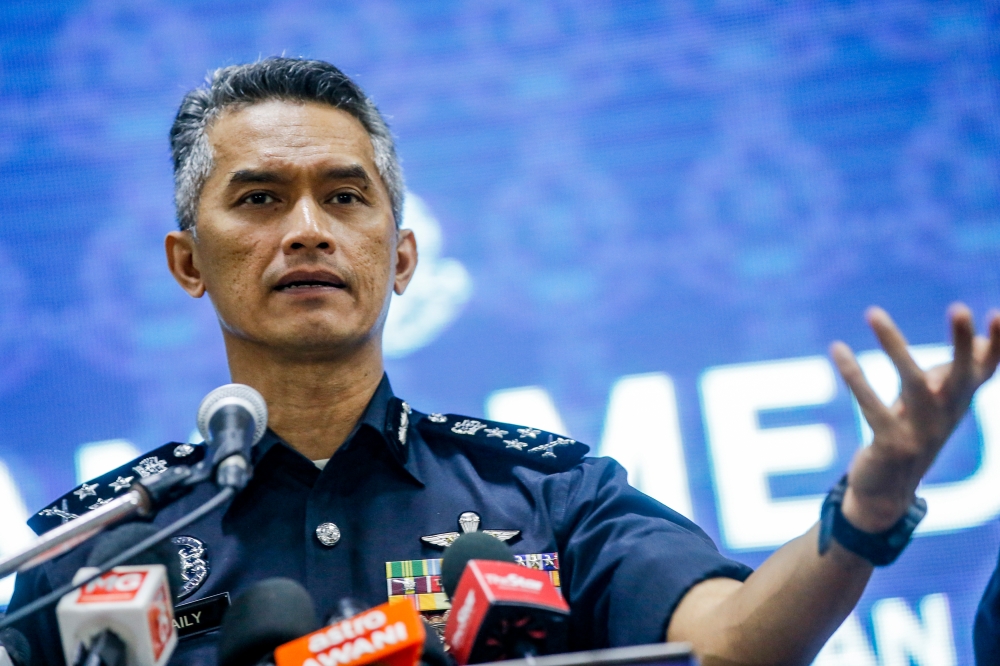 Criminal Investigation director Commissioner Datuk Seri Mohd Suhaily Mohd Zain speaks to the media during a press conference at the Selangor Police Contingent Headquarters in Shah Alam January 10, 2024. — Picture by Hari Anggara