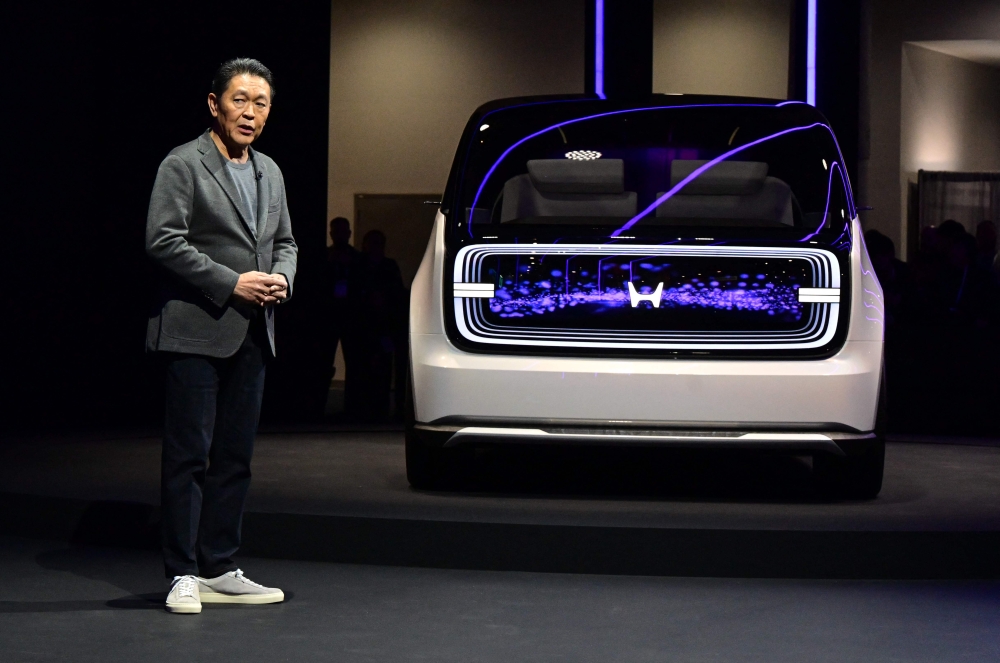 Shinji Aoyama, Chief Director of North America Japanese automaker Honda, unveils its electric vehicle concept Space-Hub during the Consumer Electronics Show (CES) in Las Vegas, Nevada on January 9, 2024. ― AFP pic