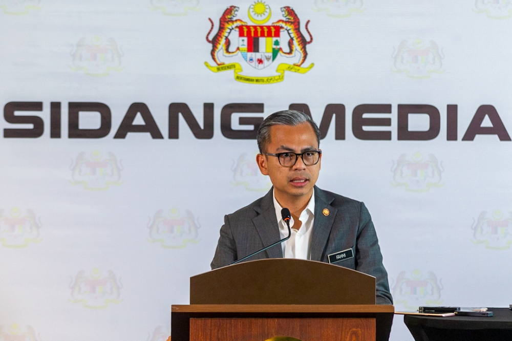Communications Minister Fahmi Fadzil Fahmi said there had been several police reports lodged on the fake news recently that RM1 billion was being touted as a war chest to entice MPs to jump ship to topple Prime Minister Datuk Seri Anwar Ibrahim’s government. — Picture by Raymond Manuel
