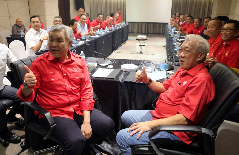 Sabah Umno Liaison Committee chairman Datuk Seri Bung Moktar Radin with Umno president Datuk Seri Ahmad Zahid Hamidi during the latter’s visit to Kota Kinabalu, January 7, 2024. — Bernama pic 