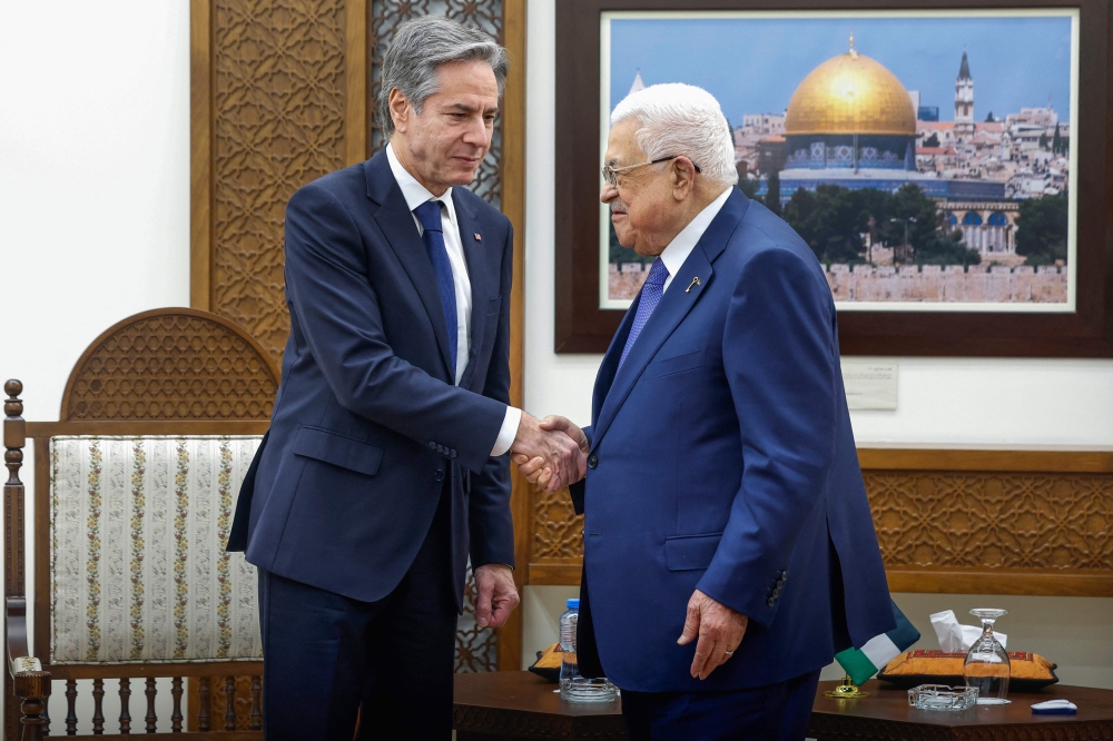 US Secretary of State Antony Blinken meets with Palestinian president Mahmud Abbas, during his week-long trip aimed at calming tensions across the Middle East, in the Muqata'a, in Ramallah in the Israeli-occupied West Bank on January 10, 2024. — AFP pic