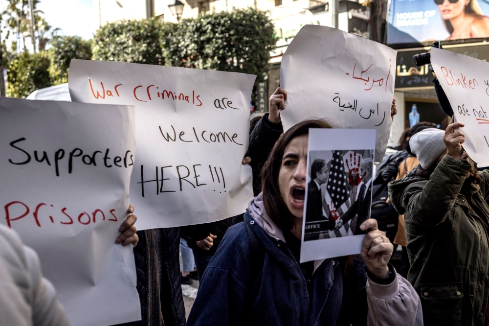 Palestinians protest against US Secretary of State Antony Blinken's visit in Ramallah, in the Israeli-occupied West Bank on January 10, 2024. — AFP pic