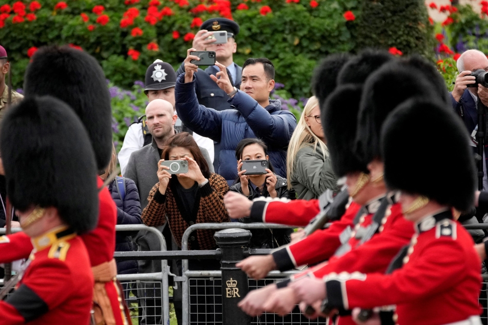 British actor Stephen Fry teamed up with animal welfare campaigners on Wednesday to demand that soldiers of the King’s Guard stop using real fur in their famous tall bearskin caps. — Reuters pic