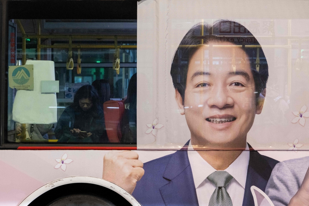 A poster of Taiwan's Vice President and presidential candidate of the ruling Democratic Progressive Party (DPP) Lai Ching-te is seen on a bus in Taipei on January 10, 2024. — AFP pic