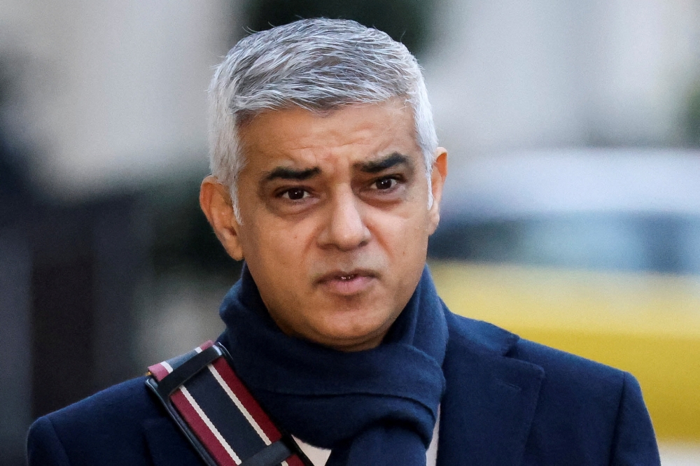 London Mayor Sadiq Khan walks on the day he gives evidence at the Covid-19 Inquiry, in London November 27, 2023. — Reuters pic  