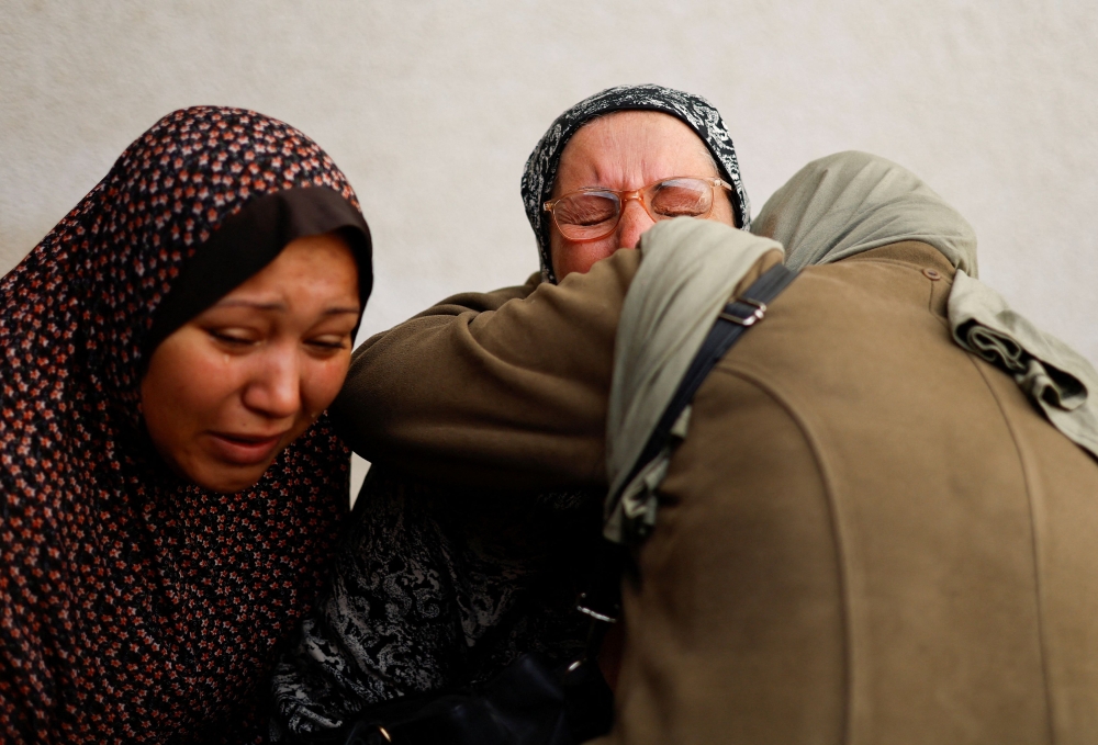 Mourners react following the death of Palestinians in an Israeli strike, amid the ongoing conflict between Israel and the Palestinian Islamist group Hamas, at Abu Yousef al-Najjar hospital in Rafah, in the southern Gaza Strip, January 11, 2024. — Reuters pic  