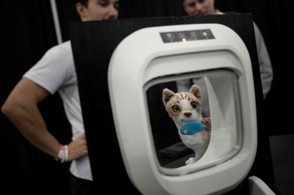 A smart pet door from Flappie Technologies is seen during CES Unveiled at the Mandalay Bay Convention Center a pre-show for this weeks Consumer Electronics Show January 7, 2024, in Las Vegas, Nevada. — AFP pic