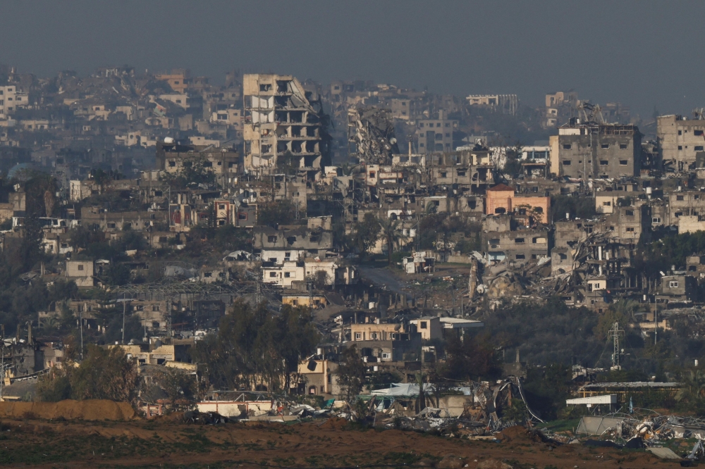 A view shows damaged buildings in Gaza, amid the ongoing conflict between Israel and the Palestinian Islamist group Hamas, as seen from Israel, January 12, 2024. — Reuters pic