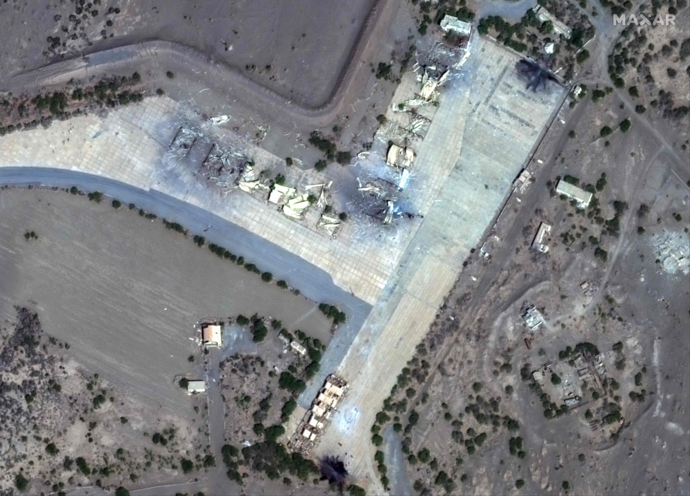 This handout satellite picture courtesy of Maxar Technologies shows destroyed shelters in Hodeida airfield, in Hodeida, Yemen on January 12, 2024, after airstrikes by the United States and Britain. — Satellite image by Maxar Technologies via AFP