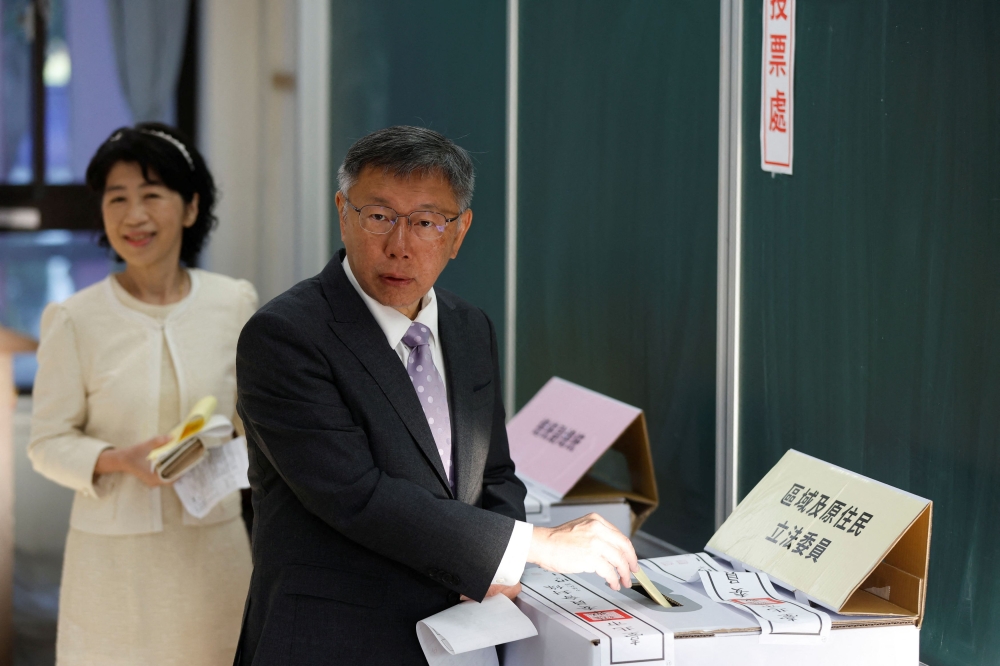 Ko Wen-je, presidential candidate of Taiwan People's Party (TPP), casts his vote during the presidential and parliamentary elections in Taipei January 13, 2024. — Reuters pic
