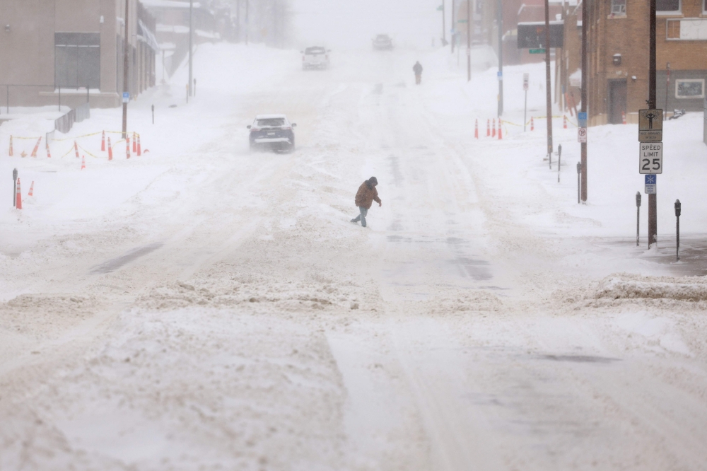 Heavy snow continues to fall on January 12, 2024 in Sioux City, Iowa. — Picture by Kevin Dietsch/Getty Images via AFP 