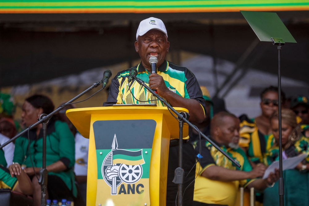 South African President and president of the African National Congress (ANC) Cyril Ramaphosa (centre) delivers his keynote address at the 112th ANC Anniversary rally in Mbombela on January 13, 2024. — AFP pic