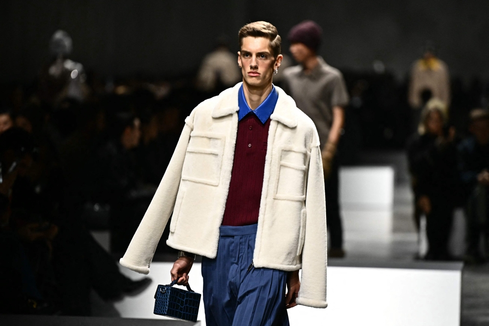 A model walks the runway at the Fendi collection show. — AFP pic
