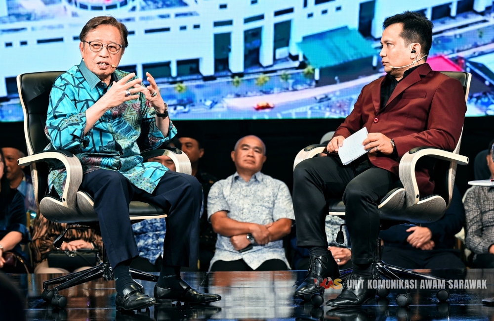 Abang Johari (left) alongside moderator Sayed Munawar during the townhall session. —Ukas pic via Borneo Post