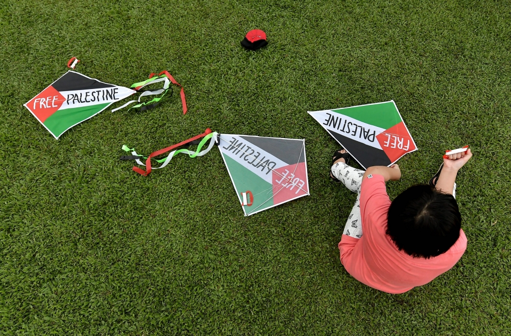 A young participant is seen with kites during the ‘Fly a Kite for Gaza’ programme in conjunction with the World Kite Day celebration at the MST Golf Driving Range @ Bukit Jelutong Golf Centre, Shah Alam January 14, 2024. — Bernama pic