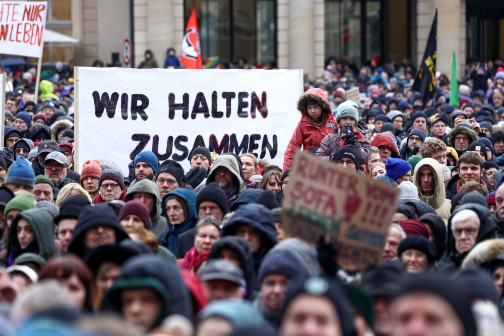 People attend a protest against right-wing extremism and for the protection of German democracy in Potsdam, Germany, January 14, 2024. — Reuters pic
