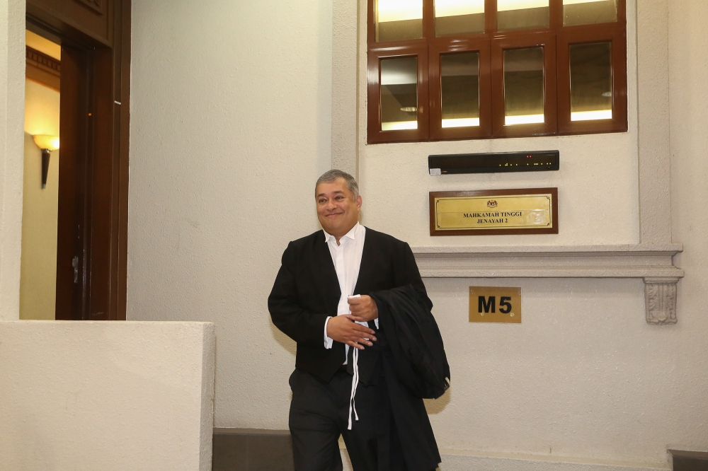 Datin Seri Rosmah Mansor’s counsel Datuk Firoz Hussein Ahmad Jamaluddin leaves the Kuala Lumpur High Court January 16, 2024. — Picture by Yusof Mat Isa