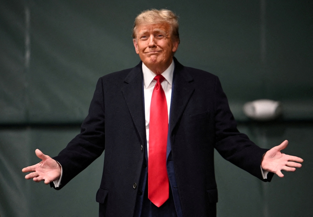Republican presidential candidate and former US President Donald Trump visits a caucus site at Horizon Event Center in Clive, Iowa January 15, 2024. ― Reuters pic