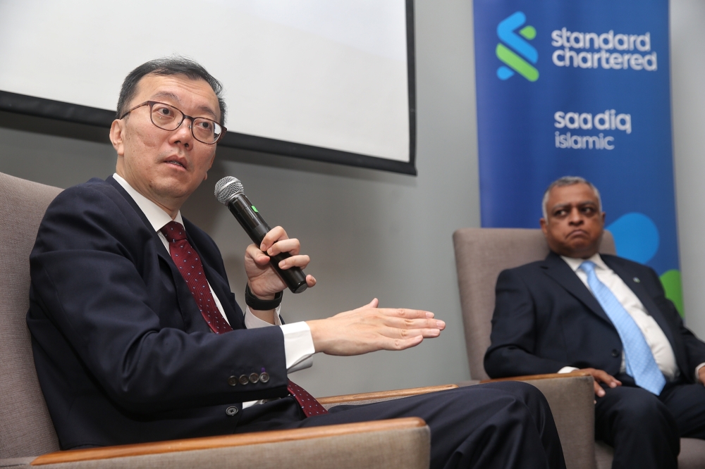Edward Lee, Standard Chartered Bank Chief Economist, Asean and South Asia, speaking at a press conference on Standard Chartered's H1 2024 Global and Malaysia Outlook, January 16, 2024. — Picture by Choo Choy May.