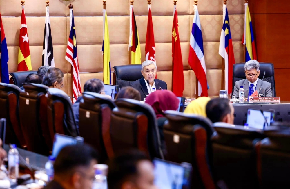 Deputy Prime Minister Datuk Seri Ahmad Zahid Hamidi chairs a meeting of the high-level committee on the management of refugees and asylum seekers in Putrajaya, January 16, 2024. — Picture from Facebook/Zahid Hamidi  