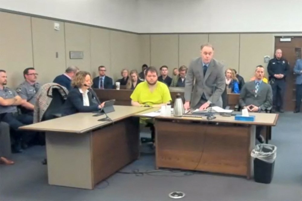Anderson Lee Aldrich, 22, appears seated before a judge during his charging hearing in Colorado Springs, Colorado December 6, 2022 in a still image from livestream video. ― El Paso County Court/Handout via Reuters