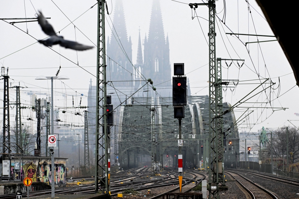 German rail operator Deutsche Bahn warned of delays and cancellations in view of the winter weather, and said it was limiting the top speed for its high-speed ICE trains to 200 kilometres per hour as a precautionary measure. — Reuters pic