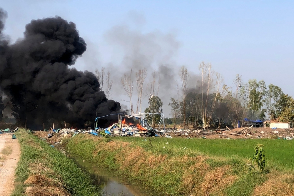 This handout from the Novice Kaew Suphanburi Highway Rescue Association taken and released on January 17, 2024 shows smoke rising after an explosion at a fireworks factory near Sala Khao township in Thailand's Suphan Buri province. — Thailand’s Novice Kaew Suphanburi Highway Rescue Association via AFP 