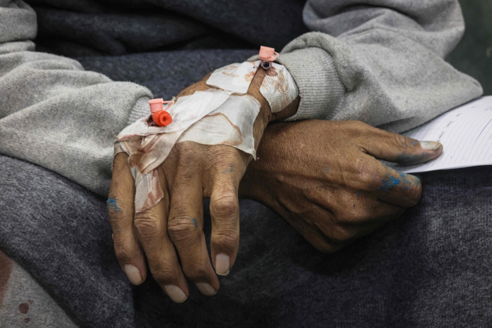 A World Health Organization official on Wednesday described dire conditions in the Gaza Strip’s remaining hospitals, where patients are “waiting to die” due to extreme shortages of staff and supplies. — AFP pic