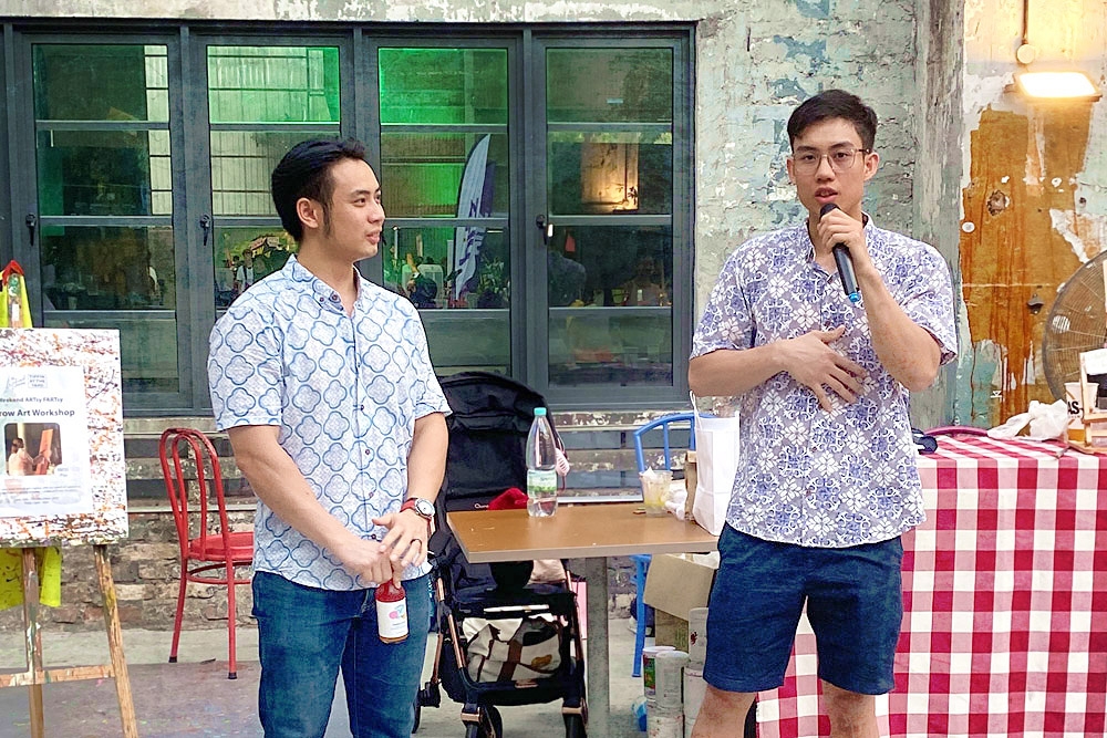 Brothers Bryan Yee (left) and Justin Yee (right) giving a health talk about kombucha.