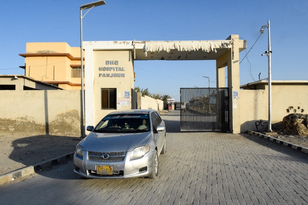A car leaves the district headquarter hospital (DHQ) in Panjgur town of Balochistan province on January 17, 2024 where victims of an Iranian air strike were moved earlier this morning. — AFP pic