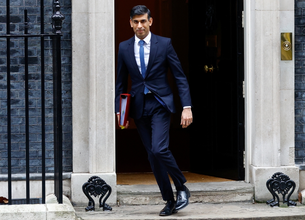 British Prime Minister Rishi Sunak has made 'stopping the boats' one of his top five priorities and is seeking to revive a plan to send asylum seekers who arrive in Britain on small boats to Rwanda after it was blocked by the courts. — Reuters pic