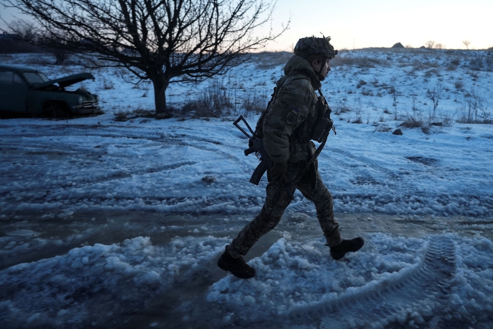 A Ukrainian serviceman of the Rarog UAV squadron of the 24th Separate Mechanized Brigade walks at a position near the town of Horlivka, amid Russia's attack on Ukraine, in Donetsk region, Ukraine January 17, 2024. — Reuters pic