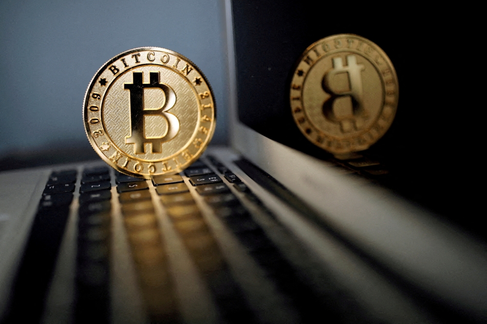 Cryptocurrencies enable people to send money around the world without using the mainstream financial system. The underlying blockchain technology creates a record of transactions where senders and receivers are identified only by their wallet addresses, which are a string of letters and numbers. ― Reuters file pic