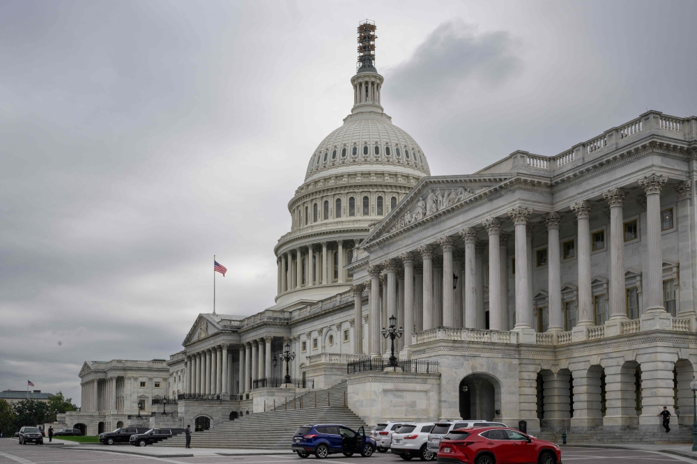 The US Congress green-lit temporary funding Thursday to thwart a partial government shutdown. — AFP pic