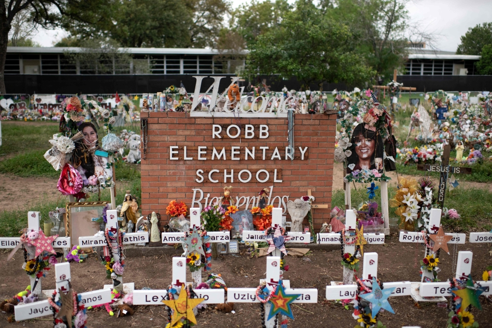Crosses set up to honor those who lost their lives during the Robb Elementary School shooting in Uvalde, Texas, on November 8, 2022. — AFP pic