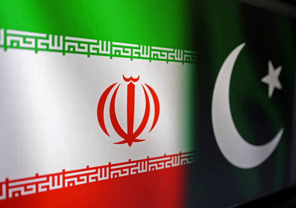Iranian and Pakistani flags are seen in this illustration taken, January 18, 2024. — Reuters pic