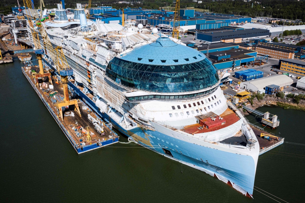An aerial view taken on May 30, 2023 shows the construction site of the Royal Caribbean’s new ship ‘Icon of the Seas’ at the Turku shipyard in Finland’s south-west coast. Some cruise operators have cancelled or adjusted their itineraries to avoid the Red Sea due to attacks on ships by Houthi militia, but the overall impact on the multi-billion dollar industry is not expected to be significant. — AFP pic 